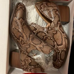 Snake print boots.